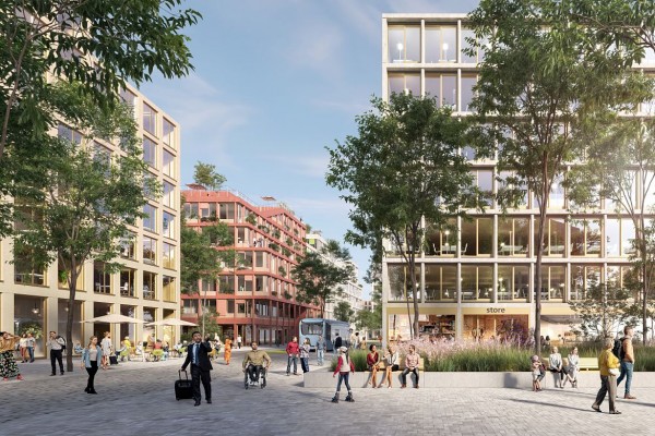 Quartiersplatz: zentraler Platz mit Außengastronomie, Geschäften, öffentlichen Sitzgelegenheiten und schattenspendenden Bäumen.